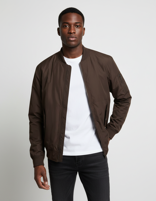 Brown bomber jacket on light-skinned Black male model